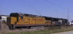 UP 9100 trails NS 9726 through the yard 